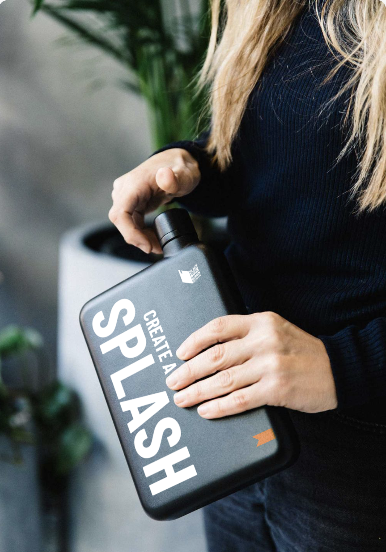 Black Book Design Collective branded bottle